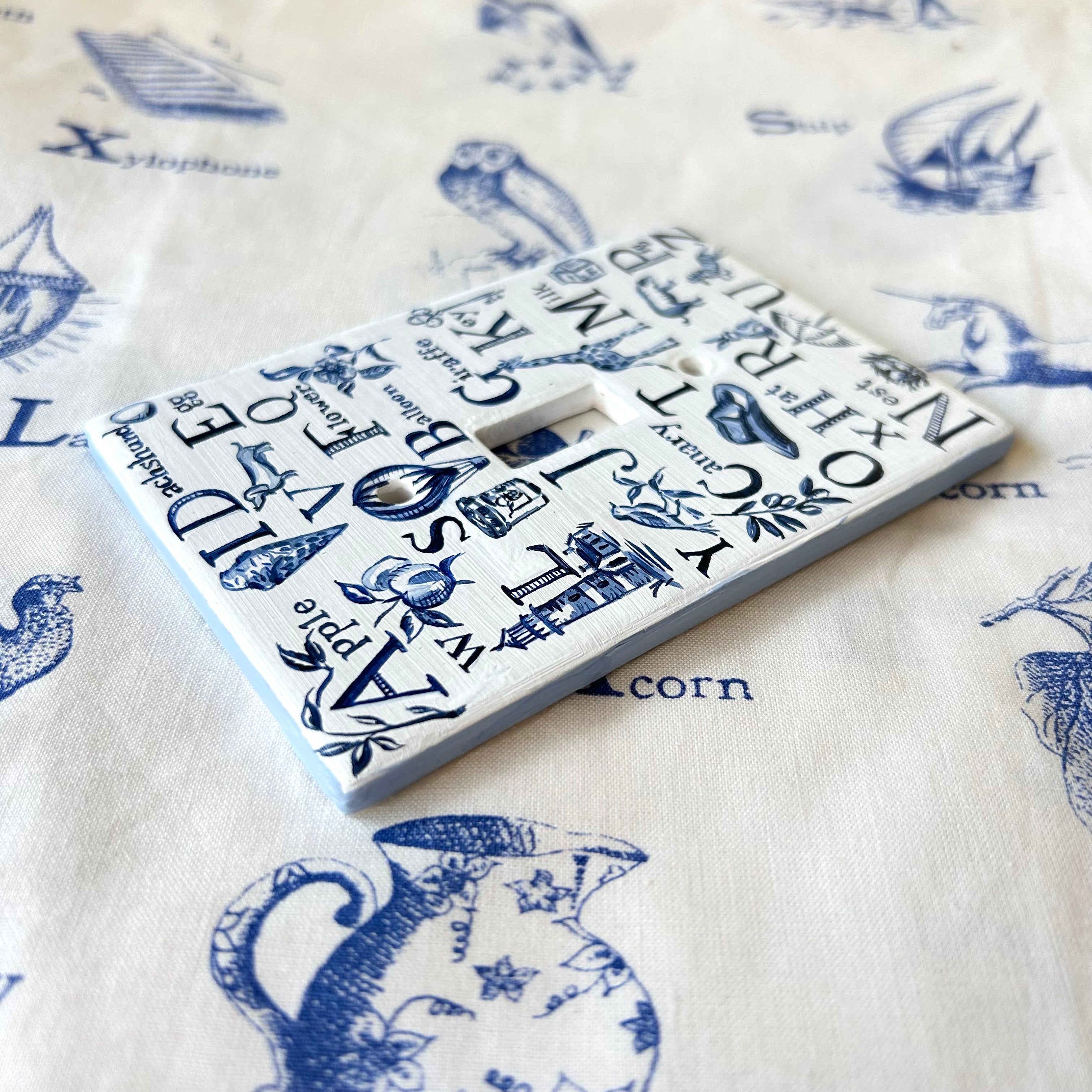 Blue and White Alphabet Switch Plate